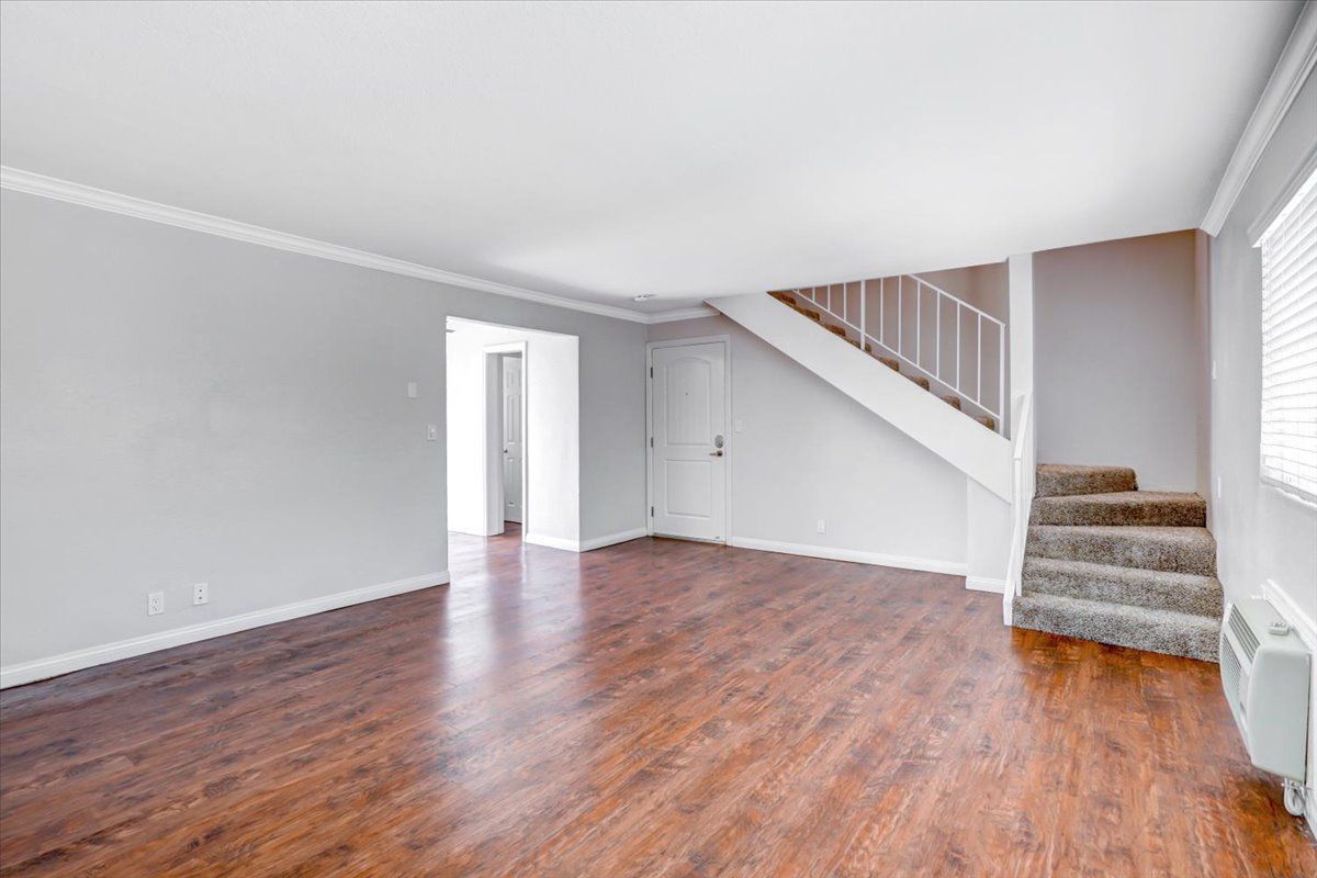 Avignon building interior livingroom with view of stairs