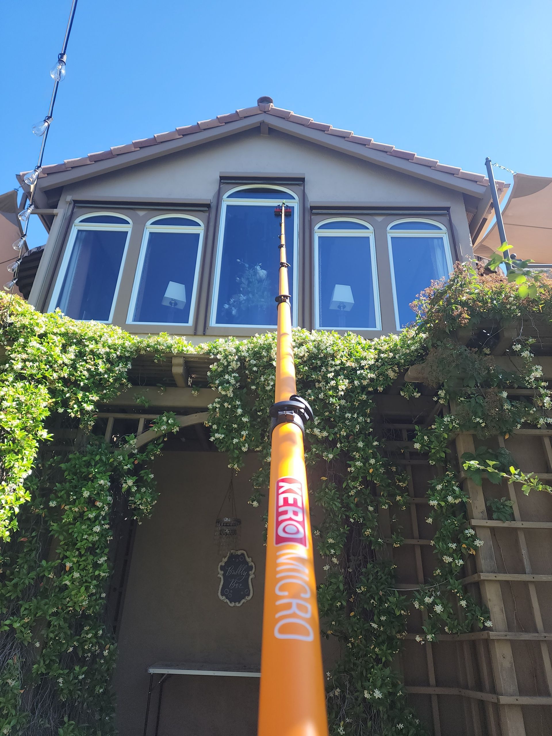 An orange pole with the word aero micro on it