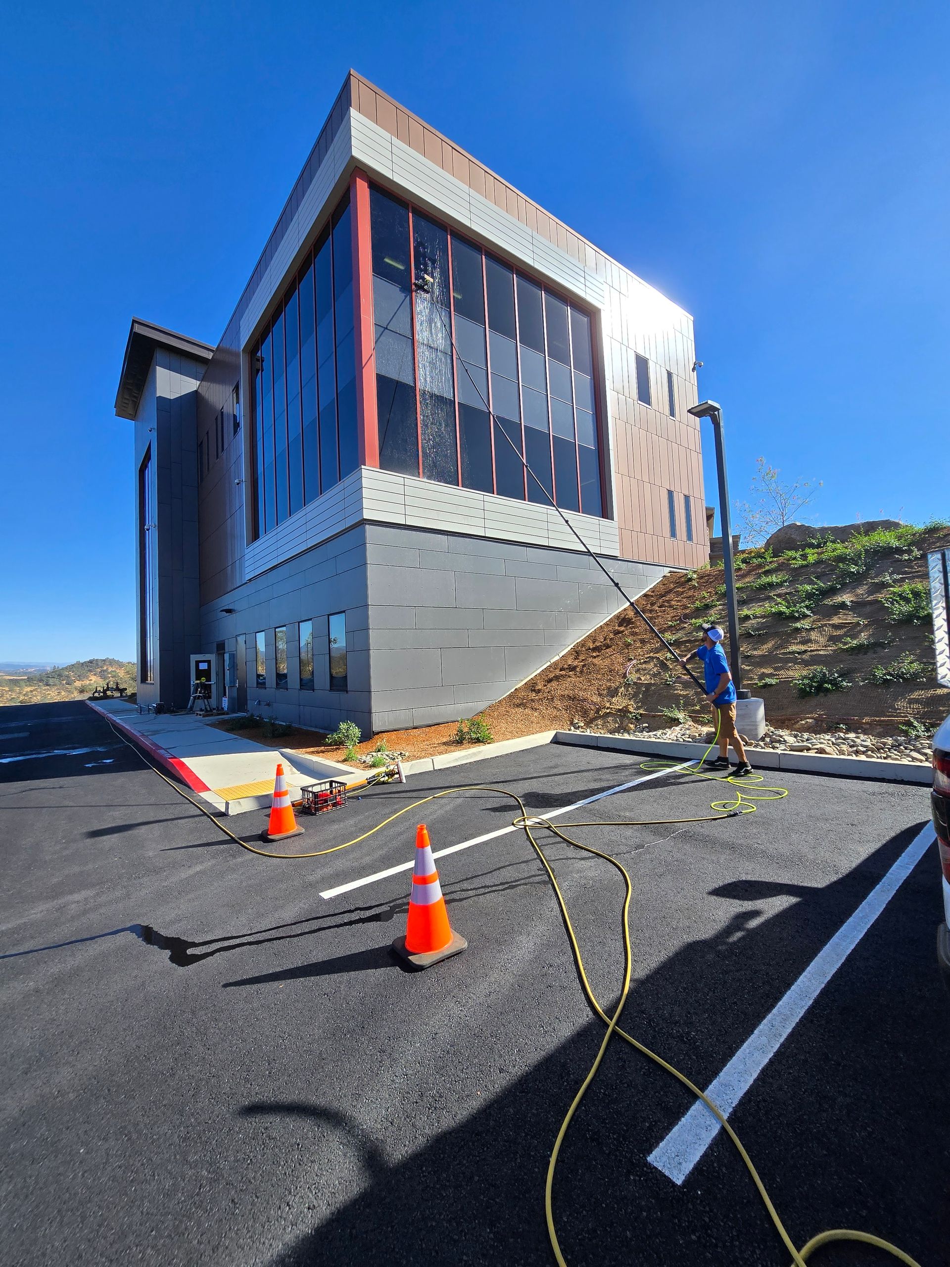 A large building with a lot of windows is being built.