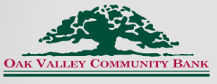 Oak valley community bank logo with a tree in the middle