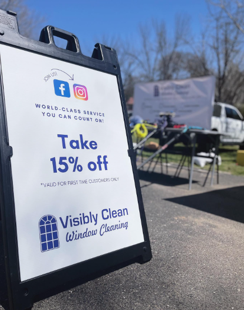 A sign that says ' take 15 % off ' on it