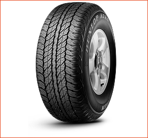 Um close de um pneu Dunlop em um fundo branco