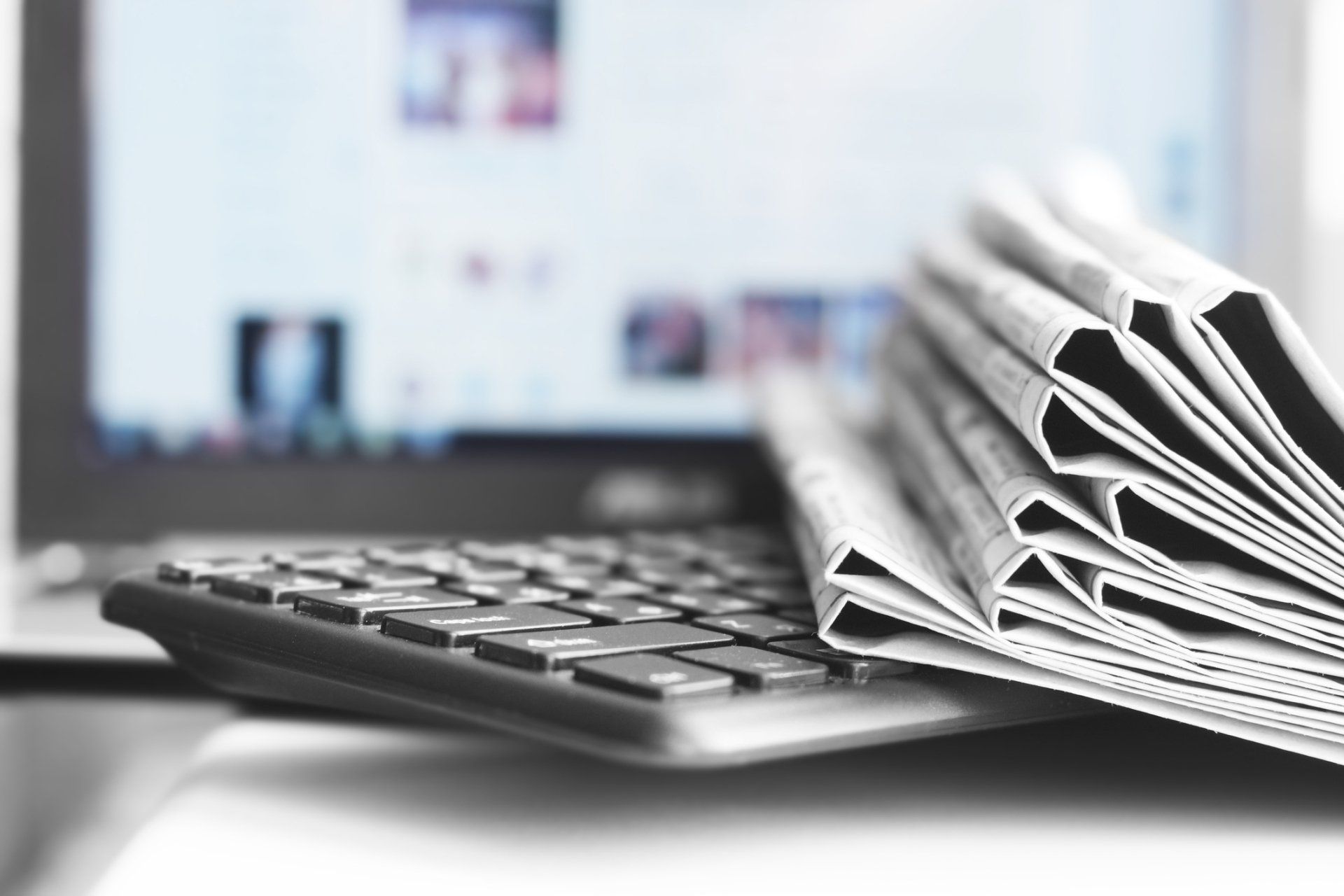Newspapers and Laptop — San Diego, CA — Dave Ray Coaching & Consulting