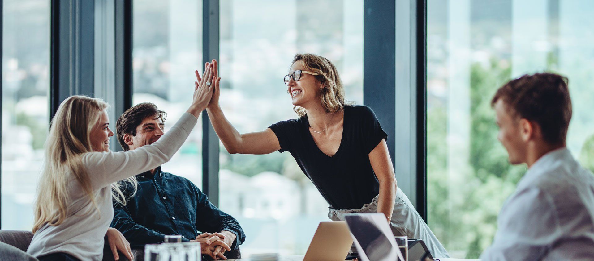 Business Team Celebrating Success — San Diego, CA — Dave Ray Coaching & Consulting