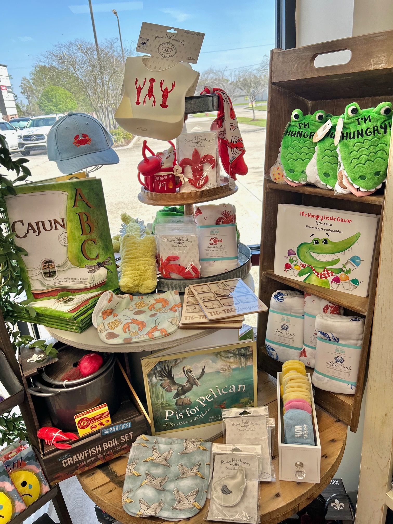 A table filled with lots of baby items and books.