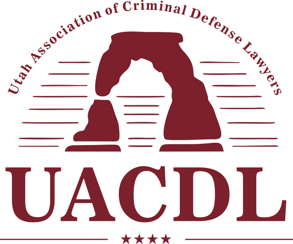 The logo for the Utah Association of Criminal Defense Lawyers.