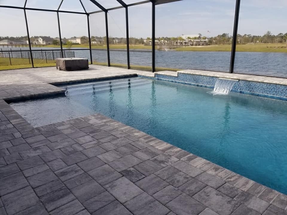 Pool with metal enclosure — Orange Park, FL — Stanley Pools, Inc