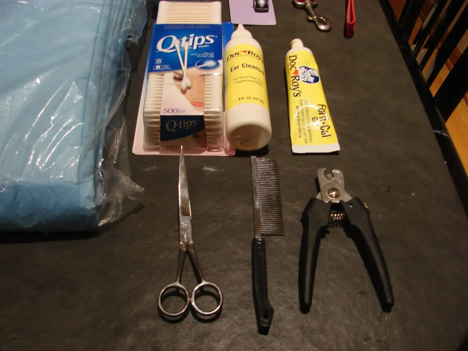 A box of chips sits on a table with other items