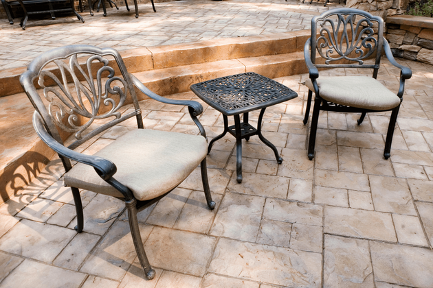 stamped concrete patio with chairs