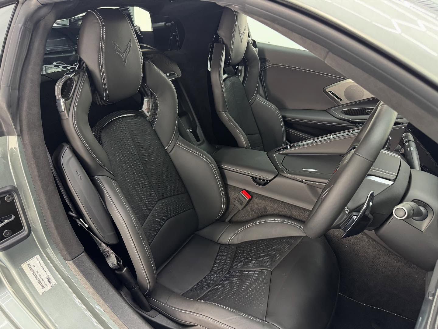 The Interior of a Gray Sports Car With Black Seats and a Steering Wheel — Bathurst Detailing Studio in Parkes, NSW