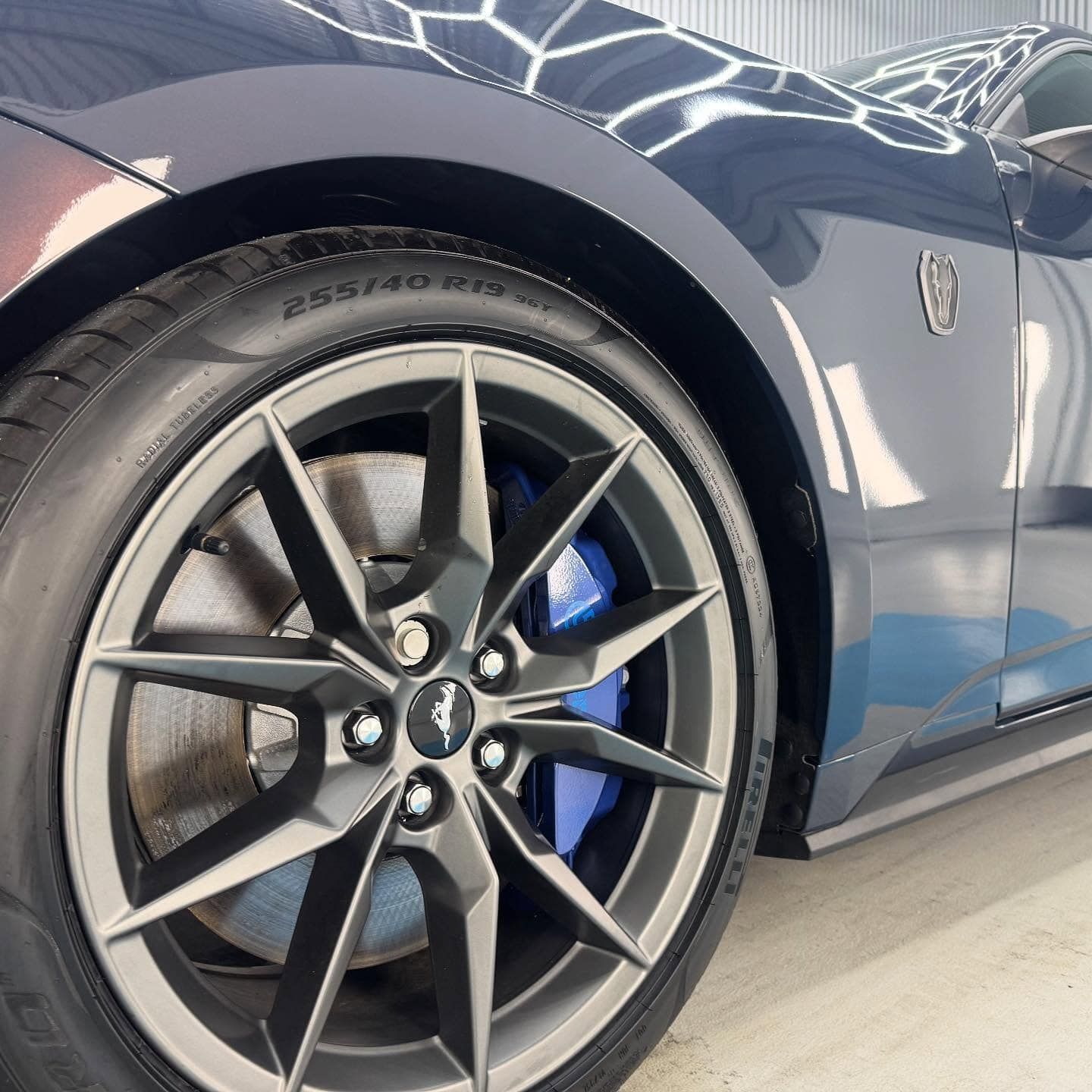 A Close Up of a Car Wheel With the Word Pirelli on It — Bathurst Detailing Studio in Mudgee, NSW