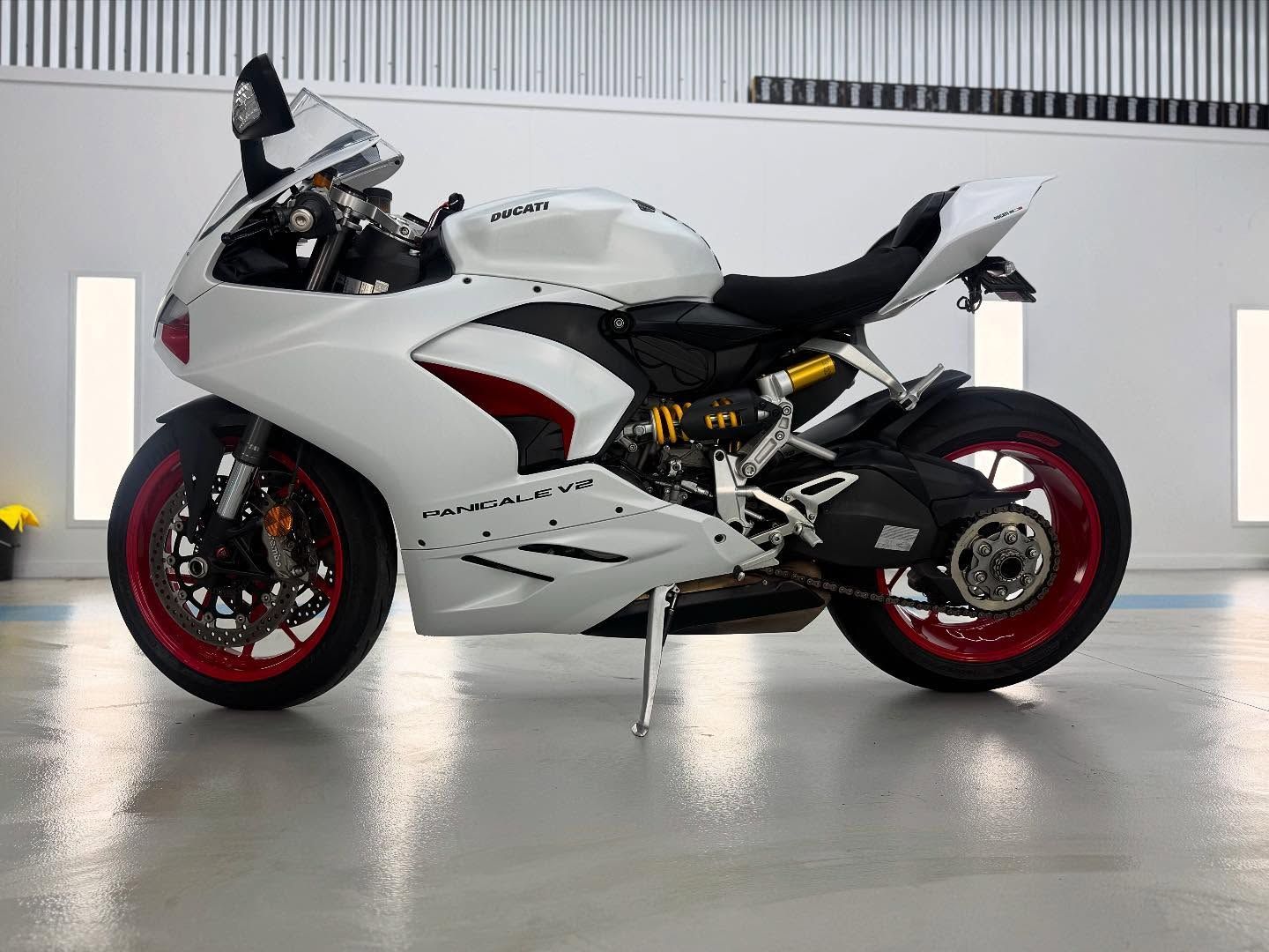A White Ducati is Parked in a Garage — Bathurst Detailing Studio in Bathurst, NSW