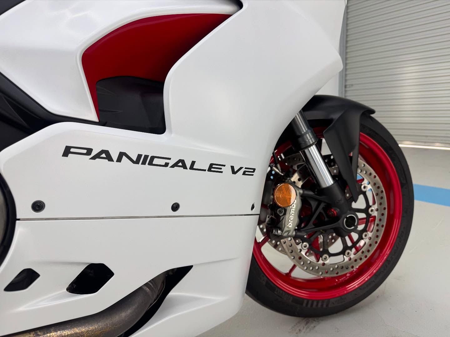 A Close up of Side of Panigale V2 Motorbike Parked in Garage — Bathurst Detailing Studio in Orange, NSW