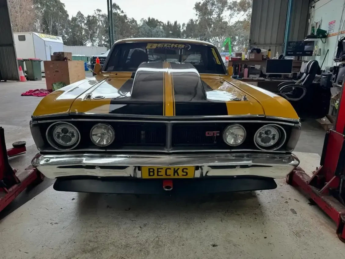 A Yellow Car With a License Plate That Says Becks — Bathurst Detailing Studio in Bathurst, NSW
