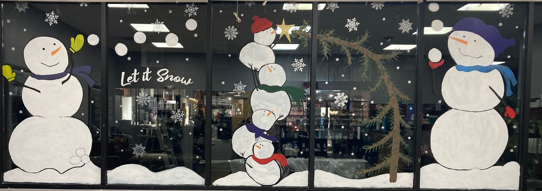 Window display with snowmen, snowflakes, and 