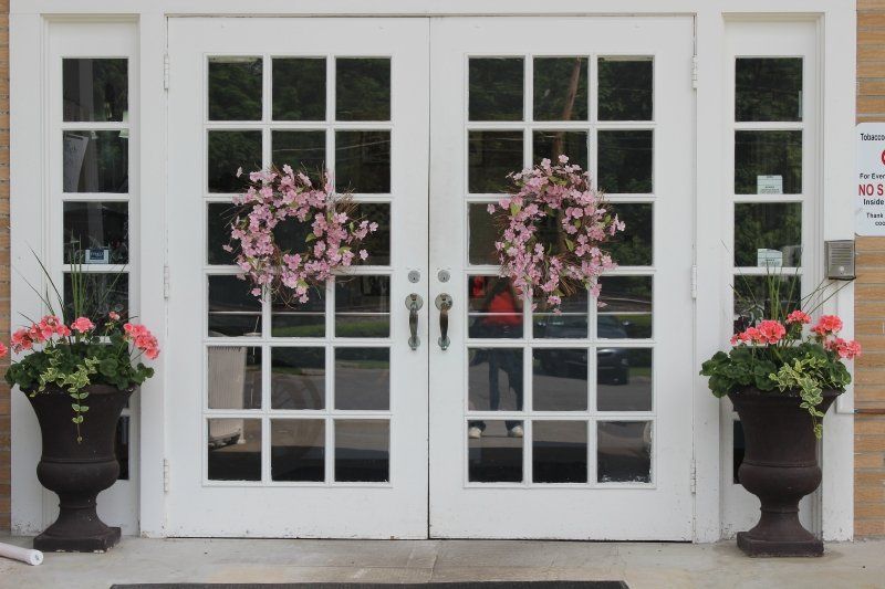 RiverView Rehabilitation and Nursing front doors with wreaths