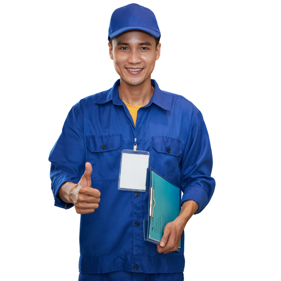 A man in red overalls and a red hat is using a tablet computer.