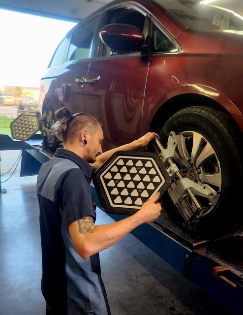 Mechanic working on Brake Disc