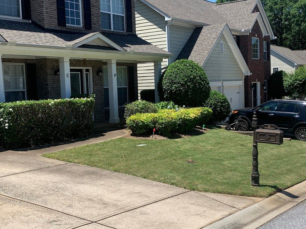 A house with a mailbox in front of it