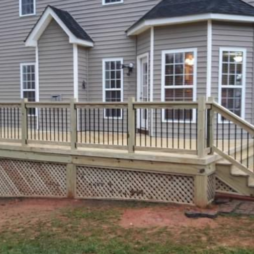 A house with a wooden deck and stairs