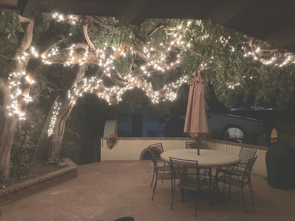 Patio with twinkle lights at night
