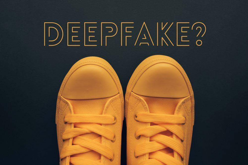 A pair of yellow trainers with the word 'deepfake' and a question mark above them