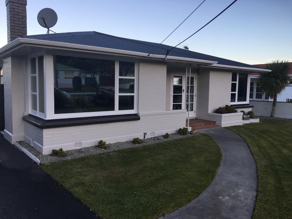 A house with a satellite - Christchurch, NZ - Tint A Window