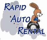 A logo for rapid auto rental with a rabbit on a tire.