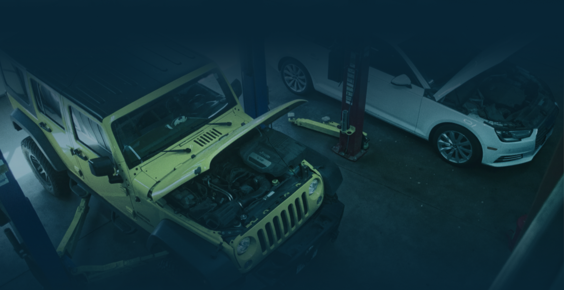 Cars in garage | Buck & Doe Auto