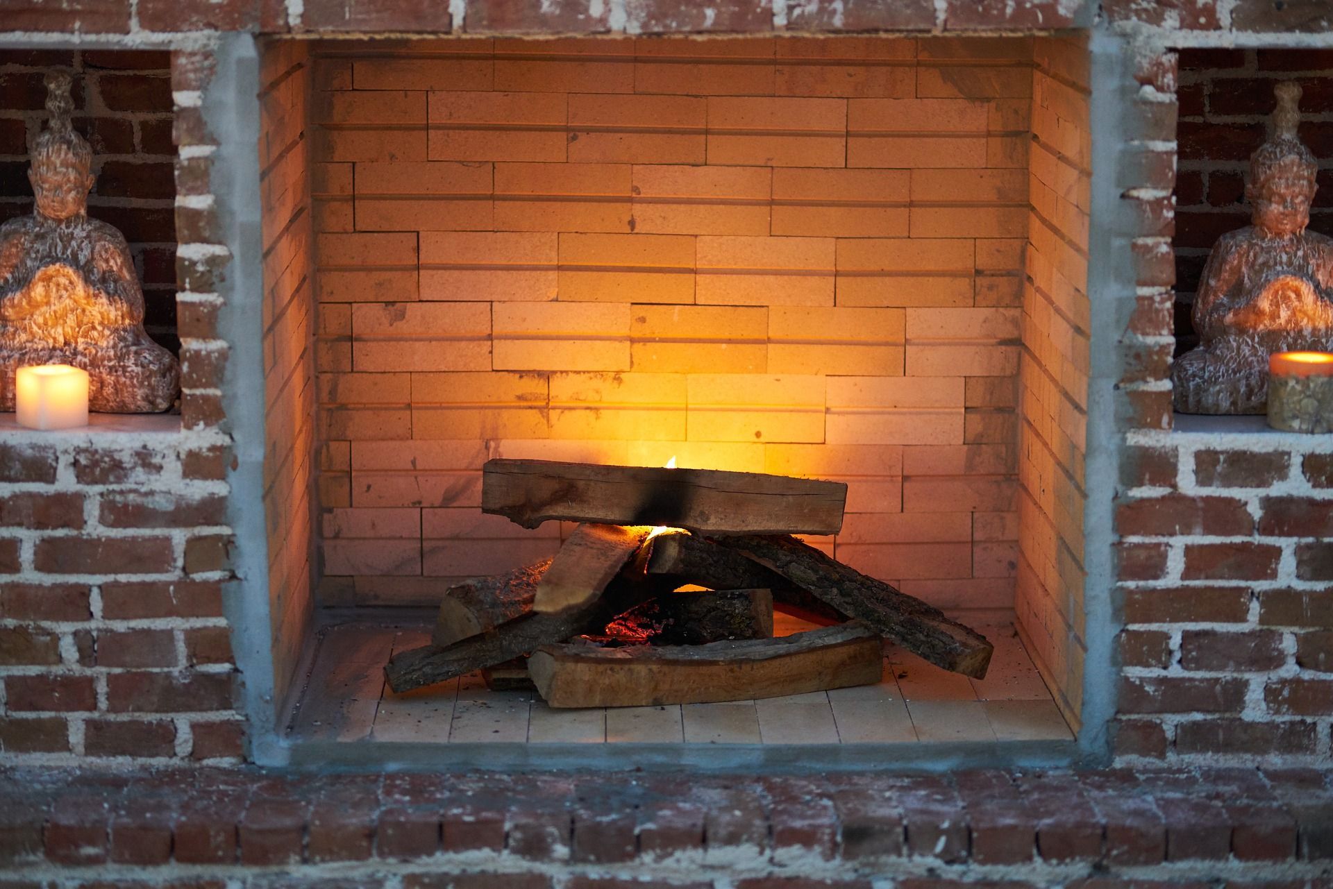 stone veneer over brick fireplace