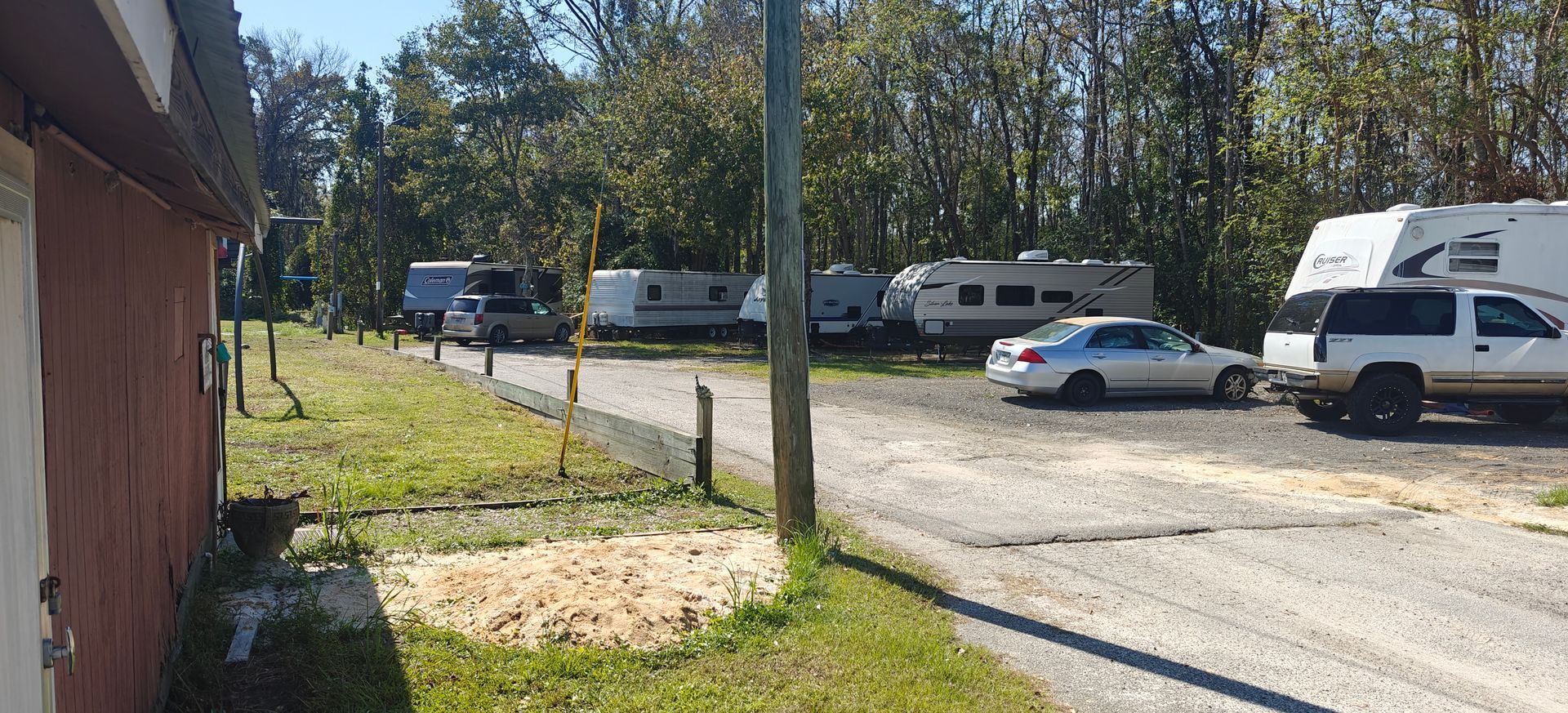 A sunset over a mountain range with a lot of fog