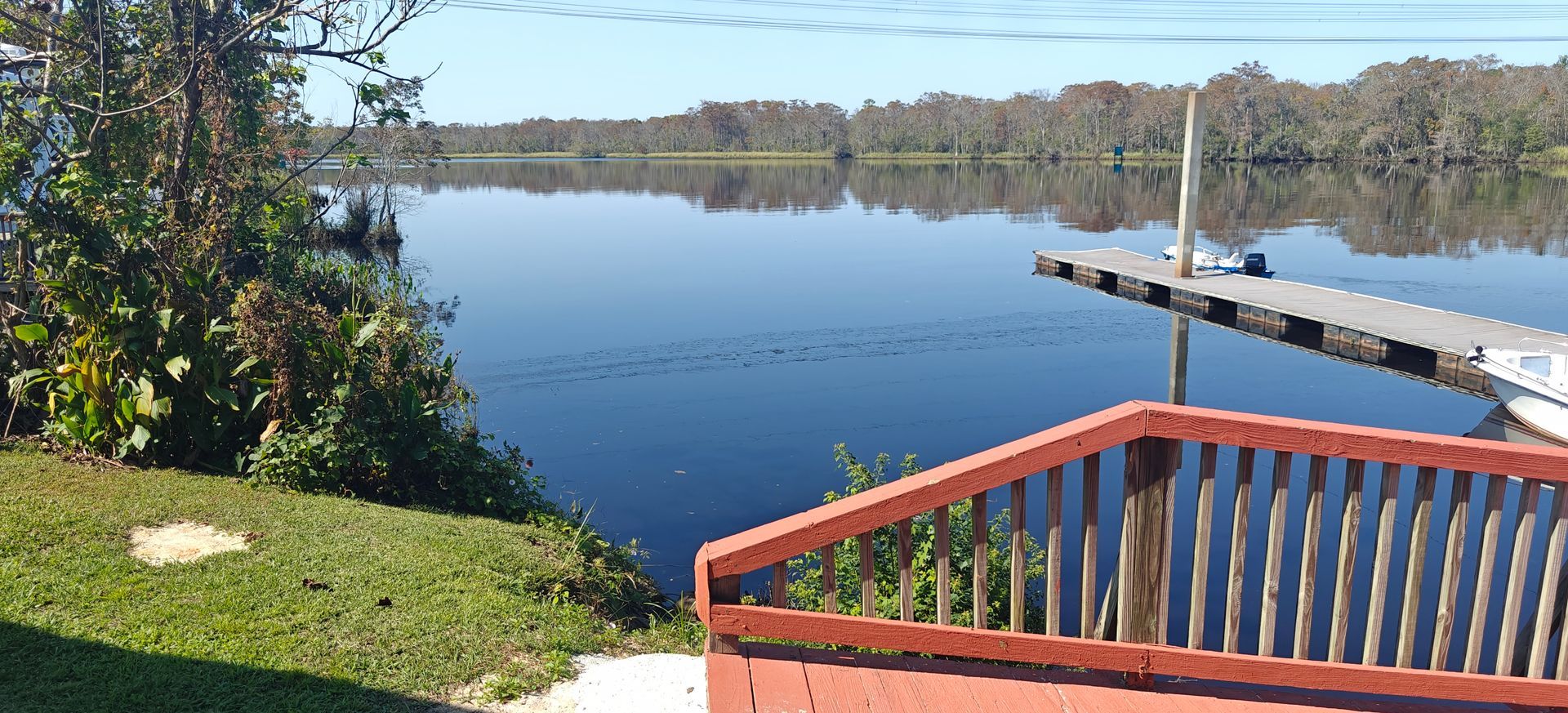 A sunset over a mountain range with a lot of fog