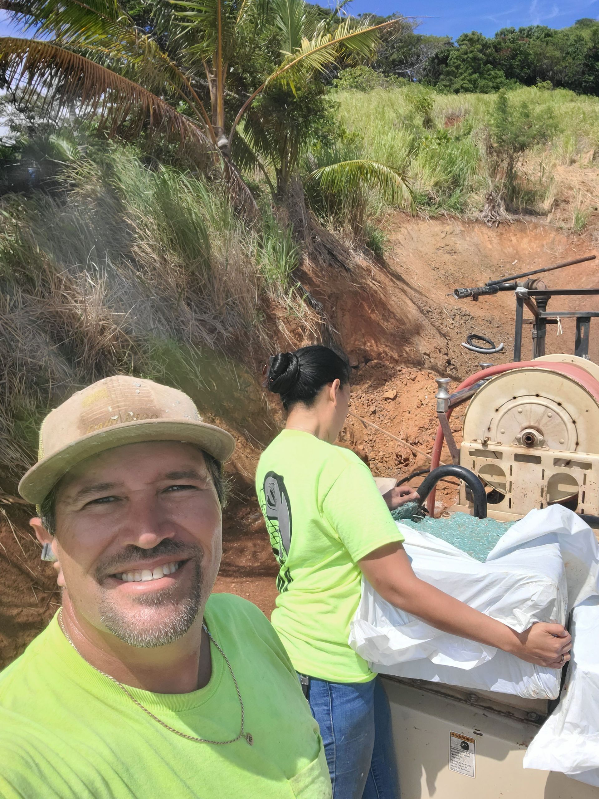 employees working on installing hydroseeding