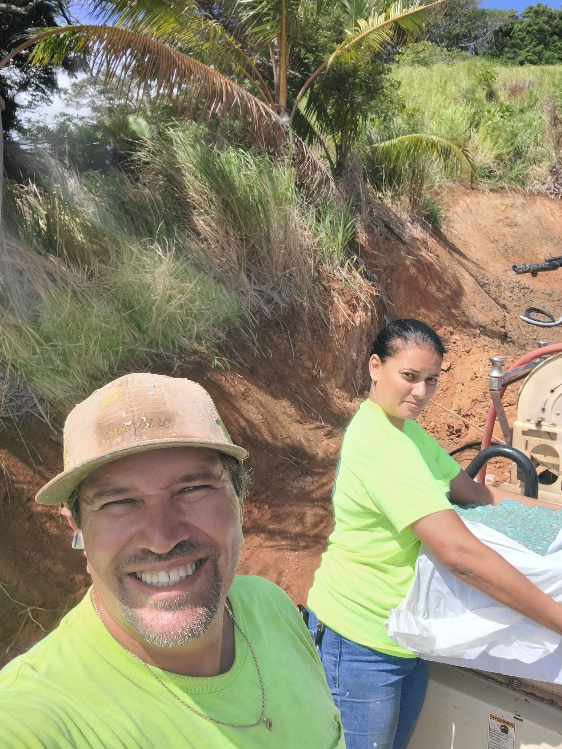 landscapers installing hydroseeding with