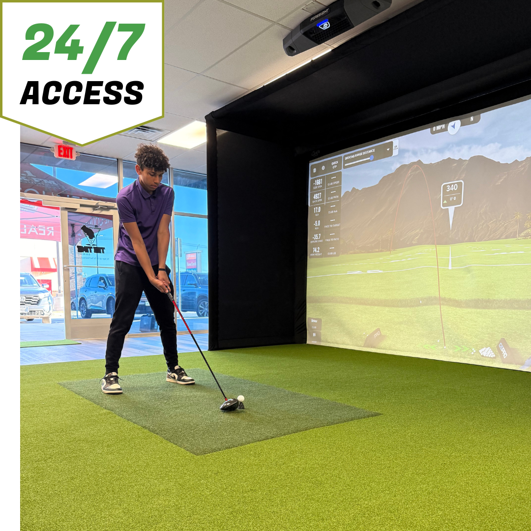 A golf ball is sitting on a tee on a golf course.