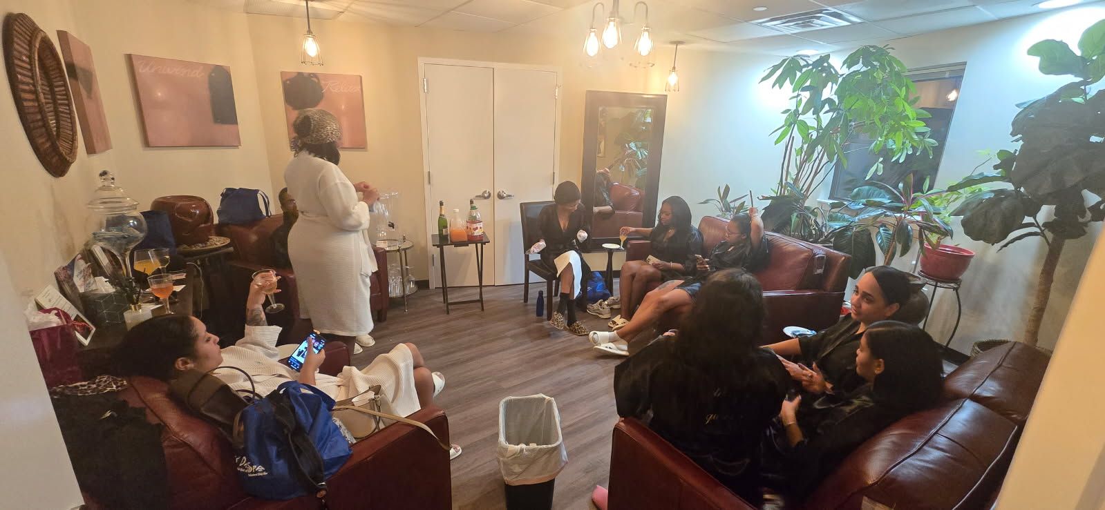 A group of people are sitting in a spa party.
