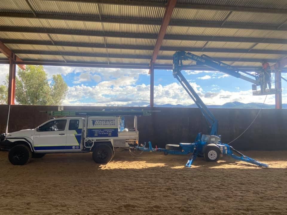 Tarbert Electrical Vehicle With Men In Service Installation — Tarbert Electrical In Loomberah NSW