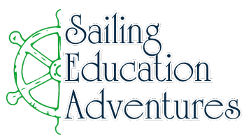 A green and white logo with a steering wheel and the words `` being education adventure ''.