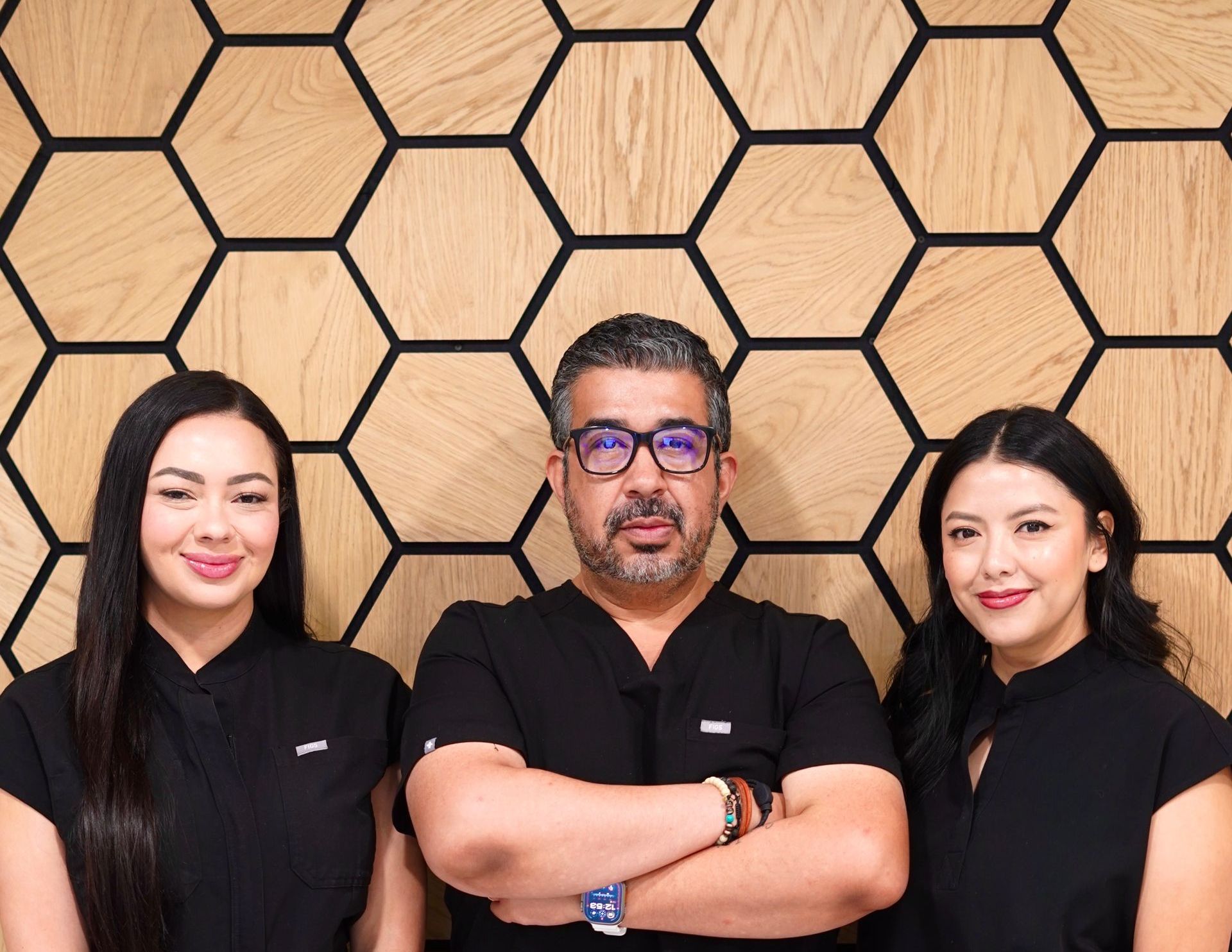Three medical professionals in uniform 