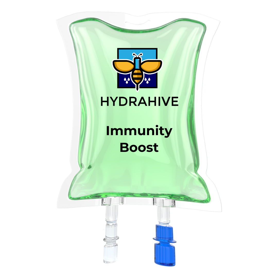 A person is holding a bag of fruit in their hand.