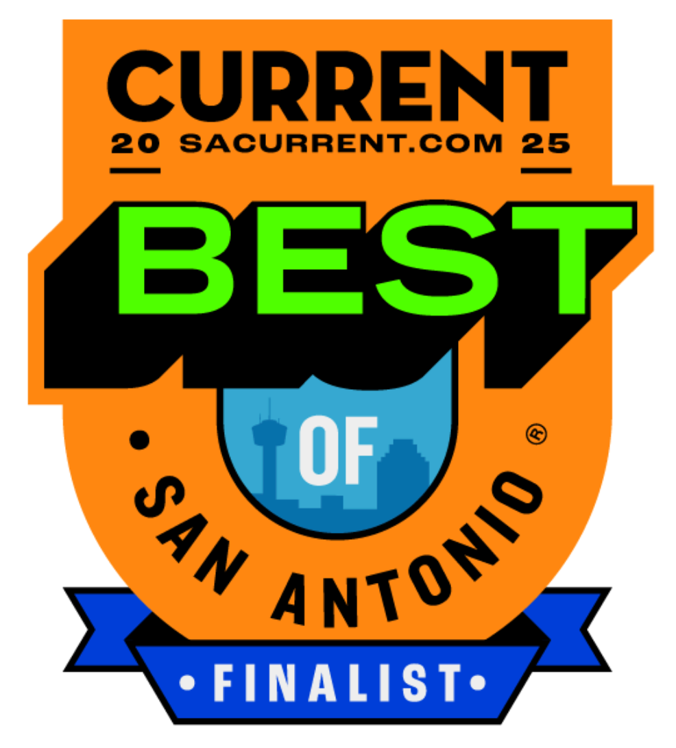 A woman is sitting in a hospital bed holding a glass of water.