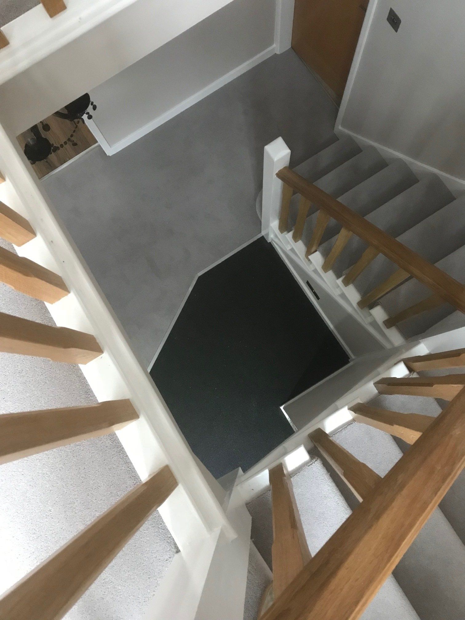 wood stair gray carpet
