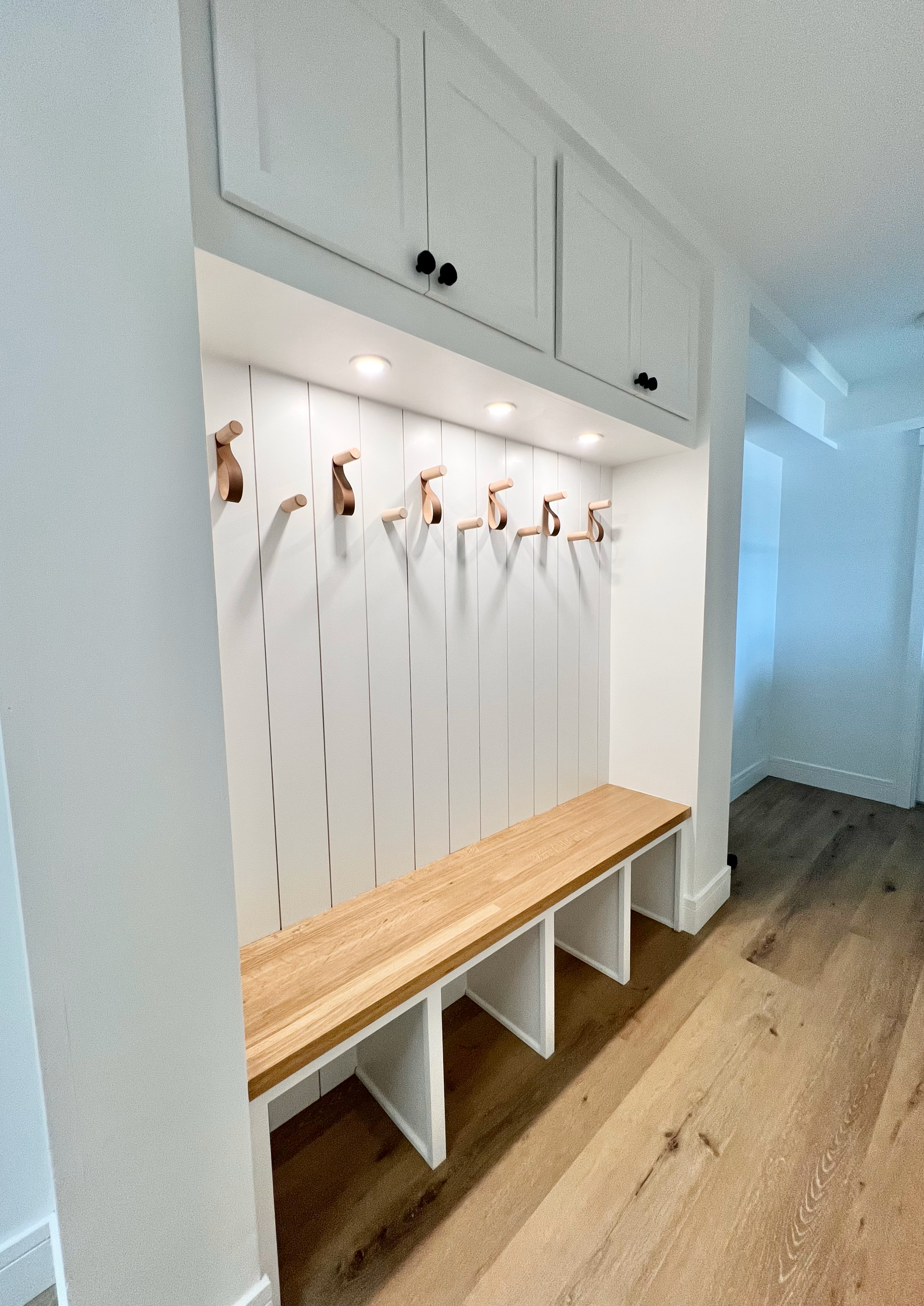 Custom-built hallway coat storage.