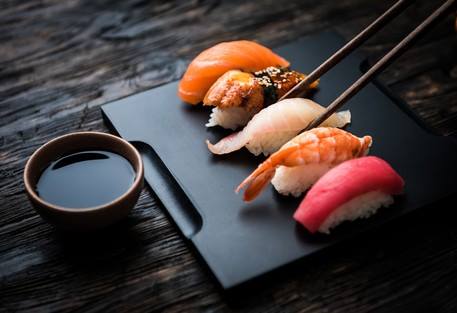Sashimi — Delicious Sushi on Knife Board in Paragould, AR