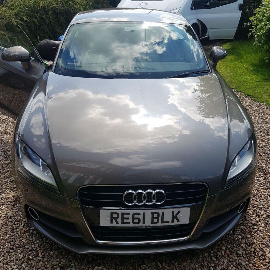 reflection on the bonnet of a freshly cleaned car