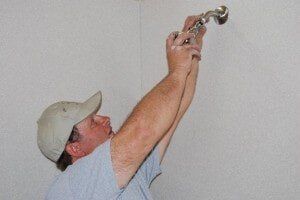 Plumber Fixing Shower Heads - plumbing services in San Tan Valley, AZ