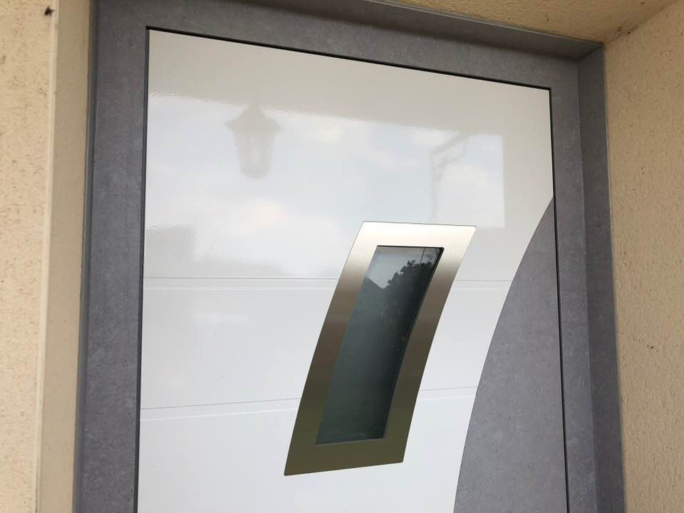 Porte d'entrée réalisation Trihome