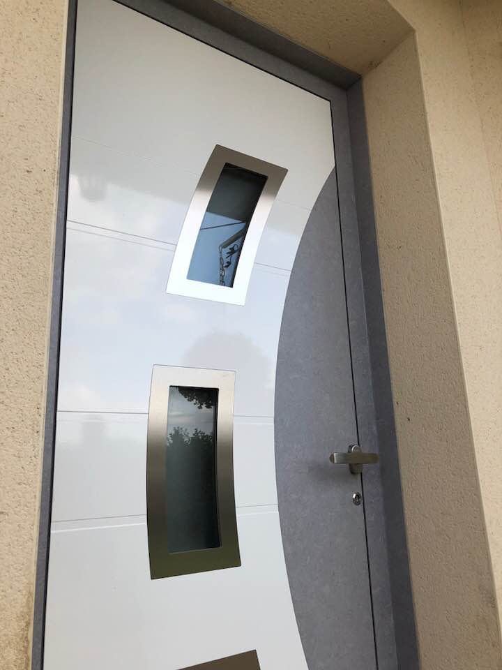 Porte d'entrée réalisation Trihome