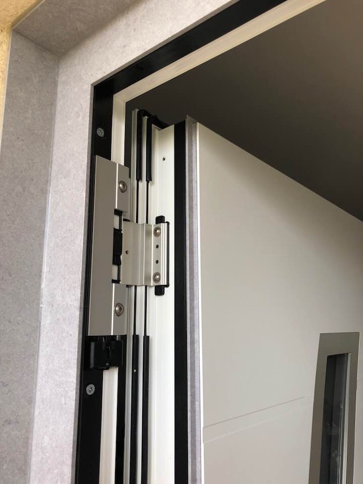 Porte d'entrée réalisation Trihome