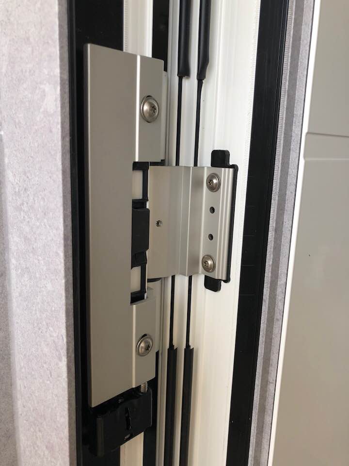 Porte d'entrée réalisation Trihome